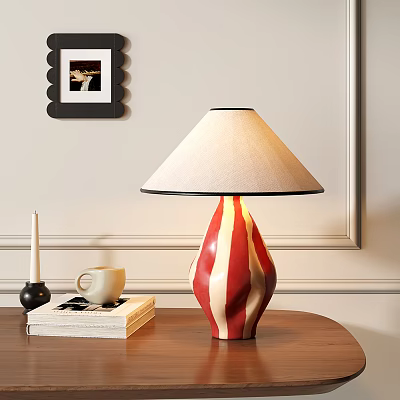 Red White Striped Table Lamp With Beige Lampshade On Wooden Table With Books And Cup 3d model
