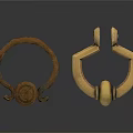 Two Ring Shaped Carved Metal Sculptures In Copper And Gold Tones
