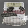Cozy Double Bed With Plaid Blanket Yellow Pillows And Red Striped Throw