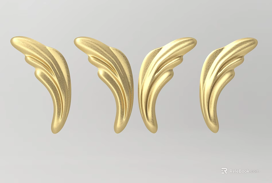 Four Golden Leaf Or Feather Shaped Carvings As Elegant Decorative Elements 3d model