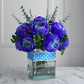 Purple Ranunculus Flowers in Glass Vase with Blue Polka Dot Ribbon and Green Leaves