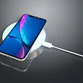 Modern Slim Laptop Charging On Wireless Charger Pad With USB Power Cable