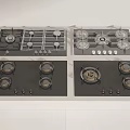 Modern Kitchen Gas Cooktops With Four Different Burner Designs And Black Glass Surfaces