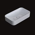 Modern White Rectangular Countertop Washbasin With Sleek Smooth Surface Design
