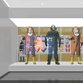 Protective Suit Mannequins Display In Glass Case With Yellow Wall Background