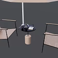Outdoor Table with Round Black Tabletop Umbrella Two Wooden Striped Chairs and Drinks