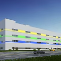 Modern Industrial Factory Exterior With Yellow Green Blue Horizontal Colorful Stripes Windows Along Roadside