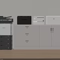 Office Appliances Including Multifunctional Printers On Storage Cabinet With White Wall And Wooden Floor