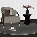 Beige Leisure Chair Set With Black Round Side Table Red Flower Vase On Round Rug