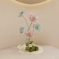 Elegant Floral Display With Pink Blue Blooms Green Foliage And Small White Flowers