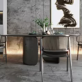 Modern Dining Table Set With Chairs Abstract Painting And Green Plants On Gray Wall