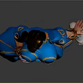 Muscular Woman In Blue Outfit With Yellow Accents And Double Buns Hairstyle
