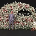 Elegant Floral Arch Installation for Gilded Night Event With Red White Flowers and Black Backdrop