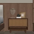 Wooden Nightstand With Woven Texture Abstract Face Sculpture And Books On Wooden Wall