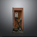 Small Building Structure With Orange Door Electrical Equipment And Potted Plants On Stone Base
