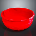 Vibrant Red Bowl Shaped Sculpture with Smooth Surface and Glossy Finish