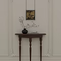 Elegant Dark Wood Console Table With Green Vase Flowers Branches And Framed Paintings
