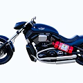 Black Classic Style Motorcycle With Red Fuel Tank And Silver Exhaust Pipes