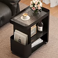 Modern Black Side Table With Flowers Coffee Cup Wine Bottle Radio And Books On Wheels