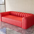 Red Upholstered Sectional Sofa With Tufted Design Rounded Arms And Marble Floor 3d model