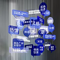 Art Installation With Hanging Blue And White Word Bubbles Against Curved Wall And Blue Boxes
