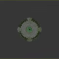 Circular Garden Fountain With Central Statue And Mossy Stone Ledges On Paved Ground