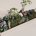 Indoor Landscape Decor With Green Plants Purple Blue Flowers Rocks Wooden Elements And Statues