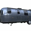 Functional Vintage Silver Travel Trailer With Aluminum Body And Multiple Windows