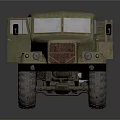 Vintage Sand Colored Military Truck With Open Cargo Bed And Large Worn Tires