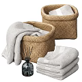 Soft White Towels In Wicker Storage Baskets With Aromatherapy Diffuser