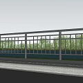 Modern Metal Railing Along Waterfront Road With Green Trees And Clear Sky