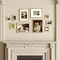 Photo Wall with Various Sized Frames and Artwork on Light Colored Wall Above Mantelpiece 3d model