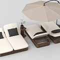 Outdoor Wicker Lounge Chairs With White Cushions Umbrella Side Table And Plant