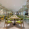 Bright Restaurant Interior With Colorful Chairs Wooden Tables Dishes And Pendant Lights