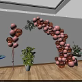 Pink And Gold Balloon Arch Decoration With Green Plants Wooden Floor White Walls And Lighting