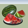 Fresh Watermelon Display With Whole Half Sliced And Cubed Pieces On Plate