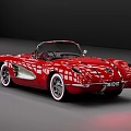 Red Classic Convertible Sports Car With Chrome Accents White Wall Tires And Retro Design