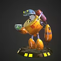 Robot Character with Blue Head Yellow Body Holding Green Orb on Black Base