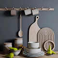 Stylish Kitchenware Display With Hanging Mugs Wooden Spoon Chopping Boards Jars And Bowls