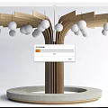 Decorative Wooden Pillar with Branch Like Extensions and Hanging White Spheres on Round Base