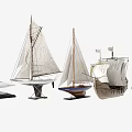 Various Model Sailboats With White Sails And Different Hull Designs On