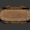 Antique Wooden Table With Carved Details Gold Accents And Curved Claw Feet