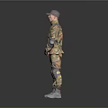 Man in Military Camouflage Uniform with Cap Knee Pads Boots Standing Against Gray Background