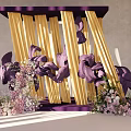 Elegant Floral Art Installation With Purple Frame Yellow Curtains And Purple Pink Floral Arrangements