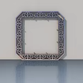 Ornate Hinged Door With Intricate Floral Carved Frame On Smooth Surface