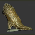 Golden Pangolin Sculpture Standing on Green Base With Detailed Scales and Lifelike Posture