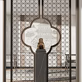 Traditional Chinese Wooden Room Divider With Intricate Cut Patterns And Circular Motifs