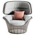 Modern Wicker Leisure Chair with Light Gray Cushion and Pink Pillow