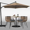 Round Outdoor Table With Woven Chairs Beige Umbrella And Decorative Lantern Pinecones