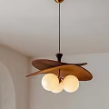 Modern Leaf Shaped Pendant Light with Three White Globe Bulbs and Minimalist Design